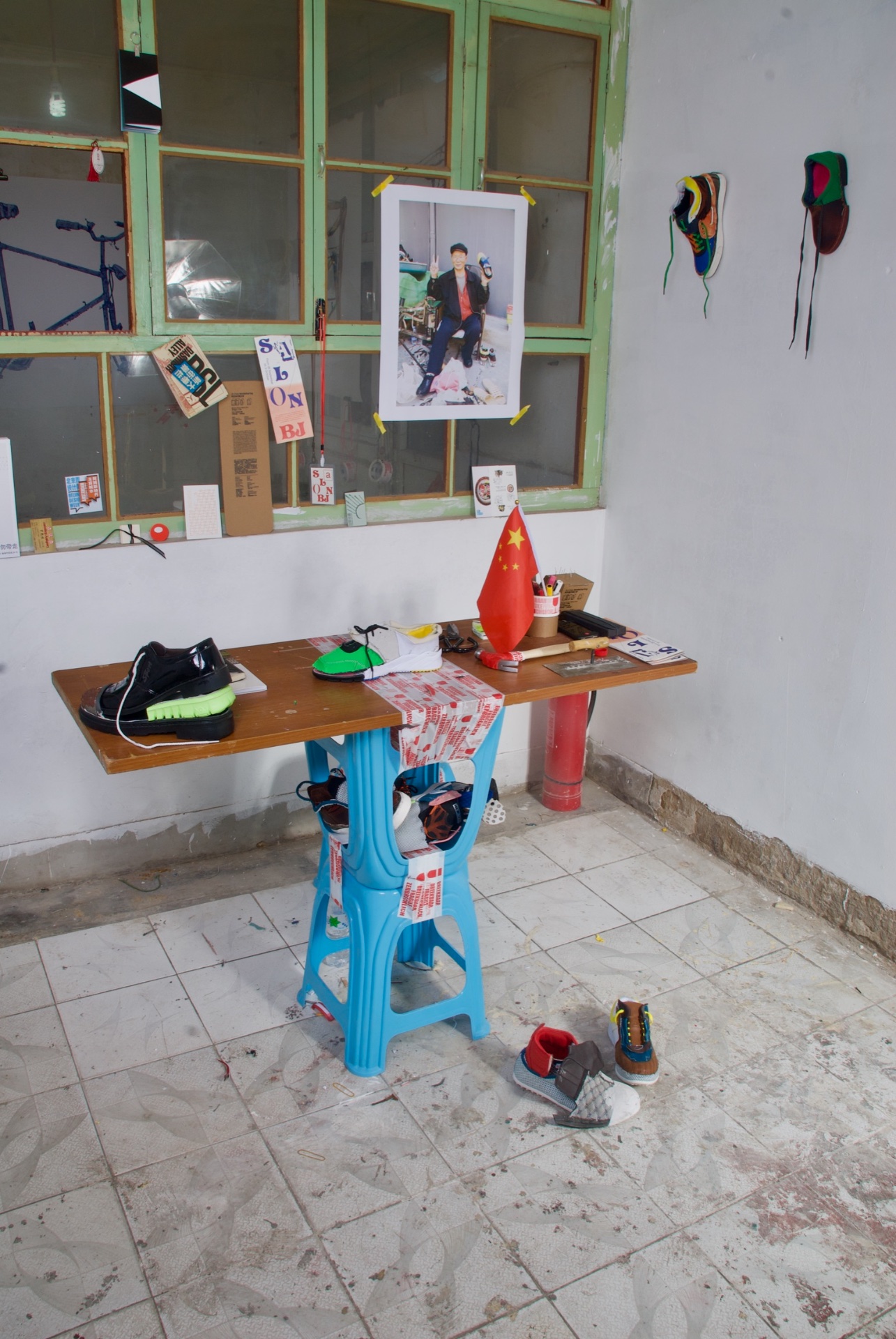 Dashilar Flagship store — 2013 — Shop where fake-brand shoes were cut apart, reassembled by local shoemakers, and presented again in the shop. — Beijing — by Sander Wassink — photo Sander Wassink