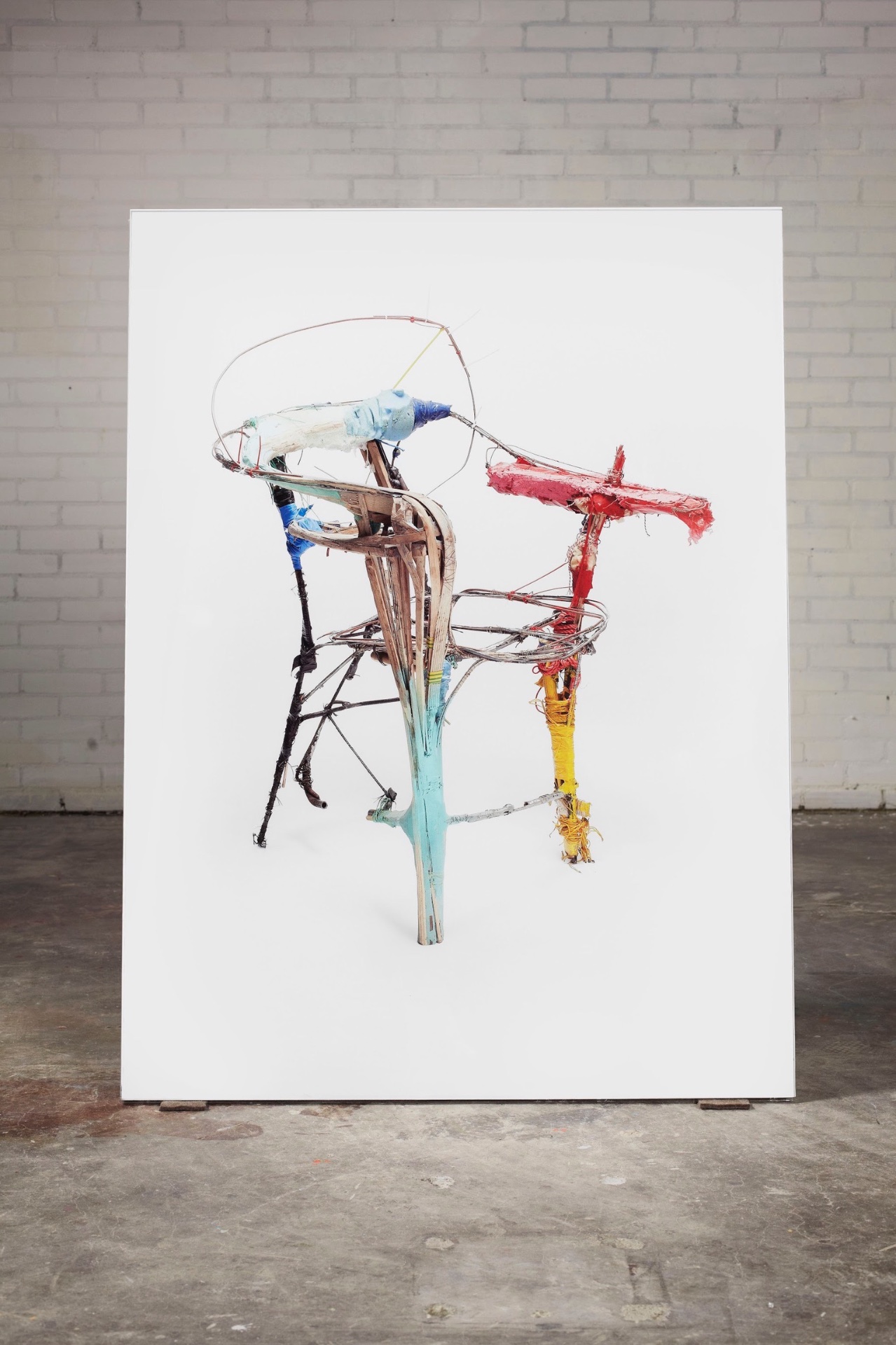 State of Transience — 2012 — Chair made of trash, repeatedly photographed and rearranged. — Eindhoven — by Sander Wassink — photo Ronald Smits
