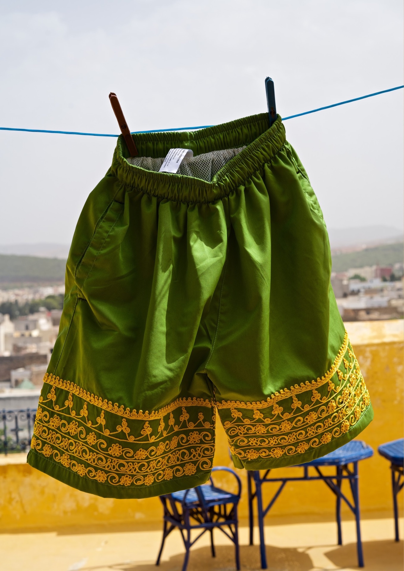 This is a counterfeit — 2016 — Fake-brand swimwear with hidden logos, adapted with local Moroccan craft to make them exportable to Europe. — Sefrou — by Sander Wassink — photo Sander Wassink