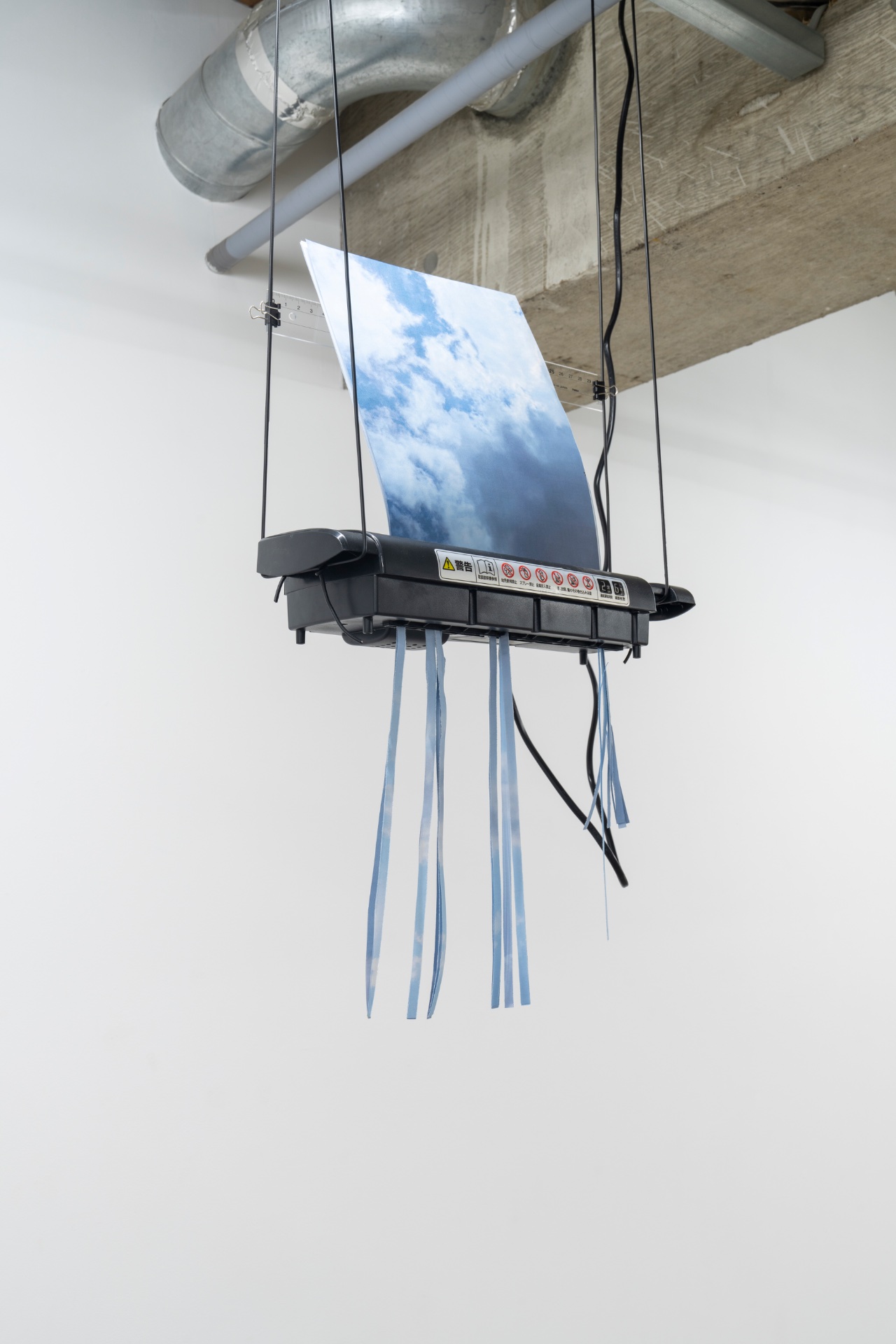 Out of office Solo exhibition — 2022 — Each day I sent the gallery owner a photograph of the sky; it was printed and shredded at the end of the day. — Tokyo — by Sander Wassink — photo Go Itami